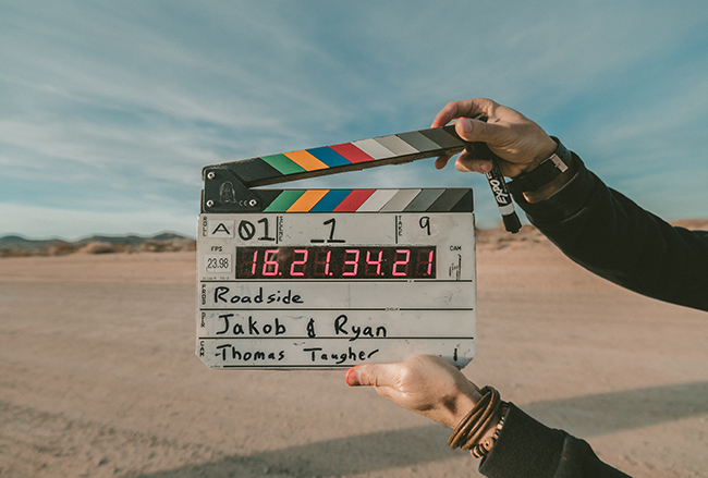 Photo of a movie clipboard by Jakob Owens on Unsplash